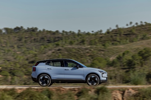 Volvo EX30 driving on a road