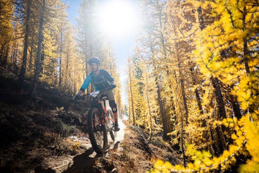 Ian Neville mounting biking
