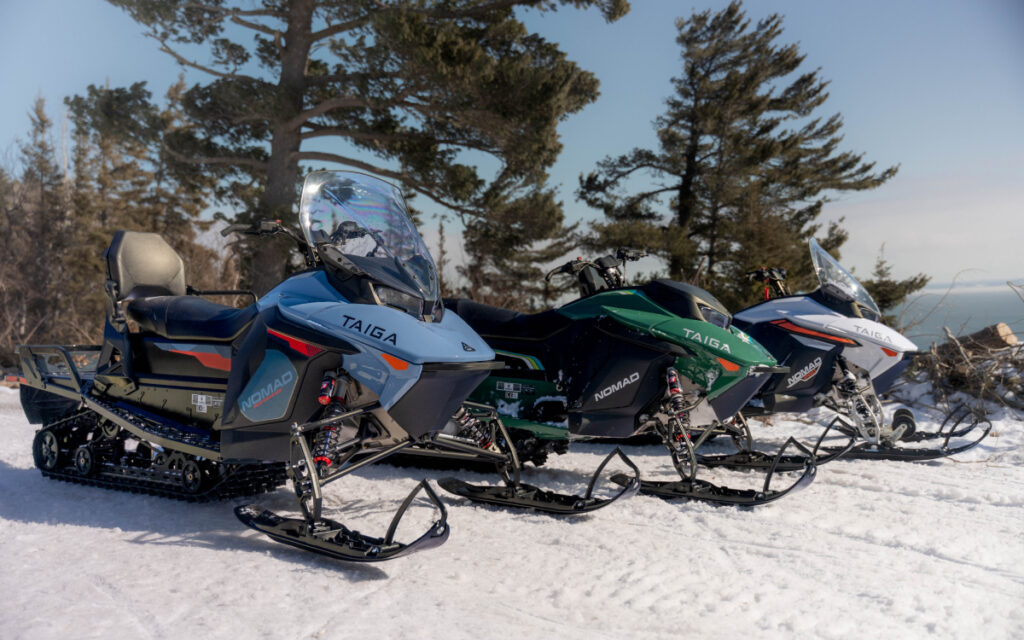 From left, the 2027 Taiga Nomad Performance, Nomad Scout, and Nomad Pro.